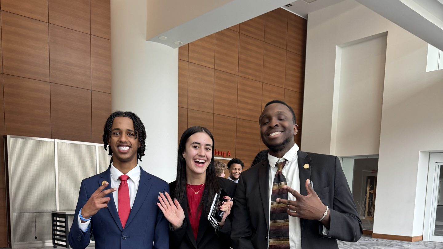 254 Marketing team members celebrating together at a company conference