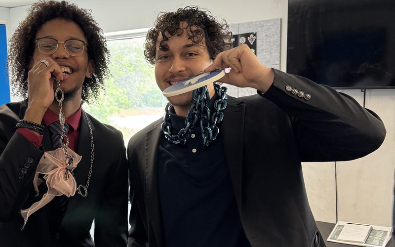 Two 254 Marketing team members joking around in the office